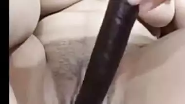 Beautiful girl with dildo masturbating her pussy