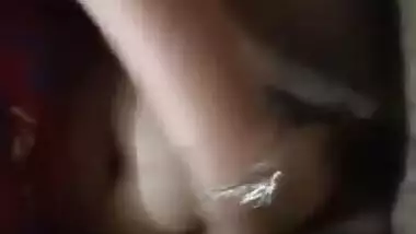 Slinky Desi slut takes her XXX coconuts out and licks sex nipple