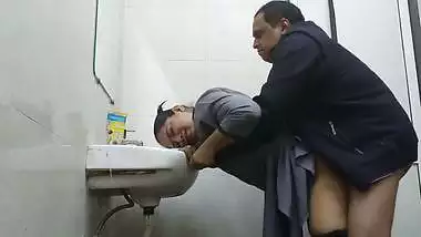 Wife in abroad fucked by office manager in washroom