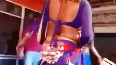 Two slim Desi teens seductively dance during XXX show under the tent
