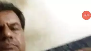 Old man enjoys a nude video call with another couple