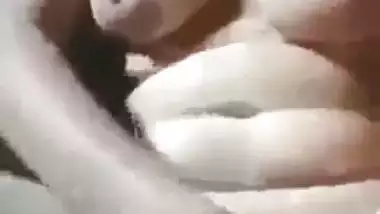 Mallu nude girl presses her juicy boobs and fingers her pussy