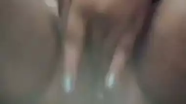 Village girl strips clothes and fingers her pussy heavily