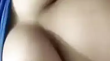 Beautiful desi girl lifting top to reveal sexy boobs