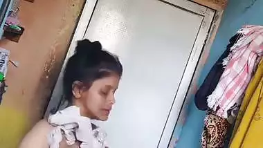 Perverted neighbor records a desi milf bathing in her bathroom